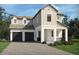 Charming two-story home with a two-car garage, neutral colors, and well-maintained landscaping at 16354 Silver Grove Blvd, Winter Garden, FL 34787