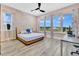 Bedroom with natural light and a ceiling fan at 17300 Pesce Loop, Montverde, FL 34756