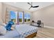 Bedroom with natural light and a ceiling fan at 17300 Pesce Loop, Montverde, FL 34756