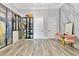Large walk-in closet with custom shelving, drawers, and trendy decor at 17300 Pesce Loop, Montverde, FL 34756