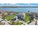Luxury waterfront home with meticulous landscaping, paver driveway, and expansive lawn at 17300 Pesce Loop, Montverde, FL 34756