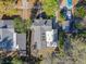 Aerial view of the property showing the house, backyard, deck, and surrounding neighborhood at 2107 University Dr, Orlando, FL 32804