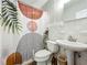 Bathroom showcasing a unique shower curtain, toilet, and vanity sink at 2107 University Dr, Orlando, FL 32804