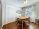Cozy dining room featuring hardwood floors, modern decor, and natural light, perfect for intimate gatherings at 2107 University Dr, Orlando, FL 32804