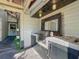 Outdoor kitchen equipped with a built-in grill, sink, and ample counter space at 2107 University Dr, Orlando, FL 32804