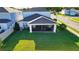 Aerial view of manicured backyard and screened in porch at 2313 Ivy Harvest Pl, Oviedo, FL 32765