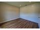 Bedroom with accent wall, wood-look flooring and recessed lighting at 2313 Ivy Harvest Pl, Oviedo, FL 32765