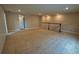 Expansive bonus room with neutral carpet, recessed lighting, and a staircase at 2313 Ivy Harvest Pl, Oviedo, FL 32765