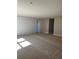 Spacious bonus room offers carpet and views of the home at 2313 Ivy Harvest Pl, Oviedo, FL 32765