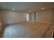 Spacious bonus room featuring neutral carpet, recessed lighting, and an accent shiplap wall at 2313 Ivy Harvest Pl, Oviedo, FL 32765