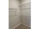 A walk-in closet with shelving offers plenty of storage space at 2313 Ivy Harvest Pl, Oviedo, FL 32765