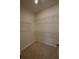 This home has a walk-in closet with carpeted floors and wire shelving for optimal storage at 2313 Ivy Harvest Pl, Oviedo, FL 32765