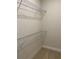 This closet features neutral colored walls and metal storage shelving at 2313 Ivy Harvest Pl, Oviedo, FL 32765