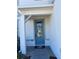 Stylish front door with decorative glass and a welcoming porch area at 2313 Ivy Harvest Pl, Oviedo, FL 32765