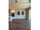 Open kitchen area with an island, pendant lighting, and large wall art at 2313 Ivy Harvest Pl, Oviedo, FL 32765