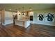 Modern kitchen featuring stainless steel appliances, pendant lighting, and an island with a sink at 2313 Ivy Harvest Pl, Oviedo, FL 32765