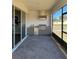 Outdoor patio with brick floor, stainless steel grill, beverage cooler and sink at 2313 Ivy Harvest Pl, Oviedo, FL 32765