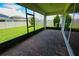 Screened-in patio with brick pavers overlooking the backyard at 2313 Ivy Harvest Pl, Oviedo, FL 32765