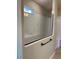 This modern bathroom features white subway tile with a frameless shower at 2313 Ivy Harvest Pl, Oviedo, FL 32765