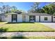 Charming single-story home with fresh exterior paint and manicured lawn at 2360 Justy Way, Orlando, FL 32817