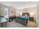 Comfortable bedroom with large windows, natural light, and modern furniture at 2365 Eagle Trace Dr, Kissimmee, FL 34746
