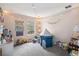 Cozy ' bedroom with natural light, play tent, and fun decor at 2365 Eagle Trace Dr, Kissimmee, FL 34746