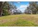 Lovely two-story home with a wide-open front yard and a charming, covered front porch at 2365 Eagle Trace Dr, Kissimmee, FL 34746