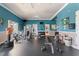 Spacious gym featuring exercise equipment, weights, and ample room for various workouts at 248 Rosso Dr, Davenport, FL 33837