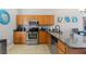 Well-equipped kitchen featuring stainless steel appliances and granite countertops at 248 Rosso Dr, Davenport, FL 33837