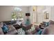Inviting living room featuring plush seating, natural light and an open, airy layout at 248 Rosso Dr, Davenport, FL 33837