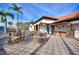 Community outdoor tiki bar with tables and chairs, perfect for relaxing and socializing with residents at 248 Rosso Dr, Davenport, FL 33837