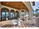 Outdoor seating area with comfortable seating and stylish design is great for resident meetups and relaxation at 248 Rosso Dr, Davenport, FL 33837