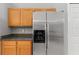 Kitchen featuring stainless steel refrigerator and ample cabinet space at 248 Rosso Dr, Davenport, FL 33837