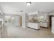 Bright kitchen featuring updated appliances and eat-in bar at 2502 Falkner Rd, Orlando, FL 32810