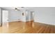Spacious living room showcasing hardwood floors and ample space for entertaining with an open floor plan at 2502 Falkner Rd, Orlando, FL 32810