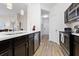 Well-lit kitchen with stainless steel appliances, sleek countertops, and modern fixtures at 2774 Almaton Loop # 403, Kissimmee, FL 34747