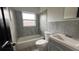 A modern bathroom with a tiled shower, new vanity, and updated fixtures at 3440 S Nashville Ave, Orlando, FL 32839