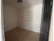 A simple bedroom features a built-in shelf and a cozy atmosphere at 3440 S Nashville Ave, Orlando, FL 32839