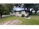 Inviting single-story home with a well-maintained lawn and easy access to the front entrance at 3440 S Nashville Ave, Orlando, FL 32839
