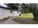 A charming home featuring manicured landscaping and a well-maintained exterior at 3440 S Nashville Ave, Orlando, FL 32839