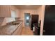 The kitchen has a stainless steel sink and matching appliances at 3440 S Nashville Ave, Orlando, FL 32839