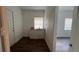 This kitchenette features white cabinets, granite countertops, and a stainless steel sink at 3440 S Nashville Ave, Orlando, FL 32839