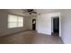 A spacious living room that offers an open floor plan and plenty of natural light at 3440 S Nashville Ave, Orlando, FL 32839