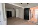 This living room offers neutral-colored tile and easy access to the kitchen at 3440 S Nashville Ave, Orlando, FL 32839