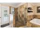 Elegant bathroom features a large glass shower and soaking tub at 40600 Louise Rd, Umatilla, FL 32784