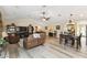 Open-concept space featuring living room, dining area, and easy access to kitchen at 40600 Louise Rd, Umatilla, FL 32784