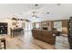 Open-concept space featuring living room, dining area, and easy access to kitchen at 40600 Louise Rd, Umatilla, FL 32784