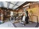 Workshop filled with a variety of tools and work benches for hobbies and home improvement at 40600 Louise Rd, Umatilla, FL 32784