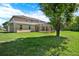 Expansive backyard featuring a screened-in pool area, perfect for outdoor living at 4393 S Devon Ct, Kissimmee, FL 34746