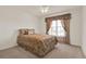 Bedroom features a cozy window with nice curtain at 4393 S Devon Ct, Kissimmee, FL 34746